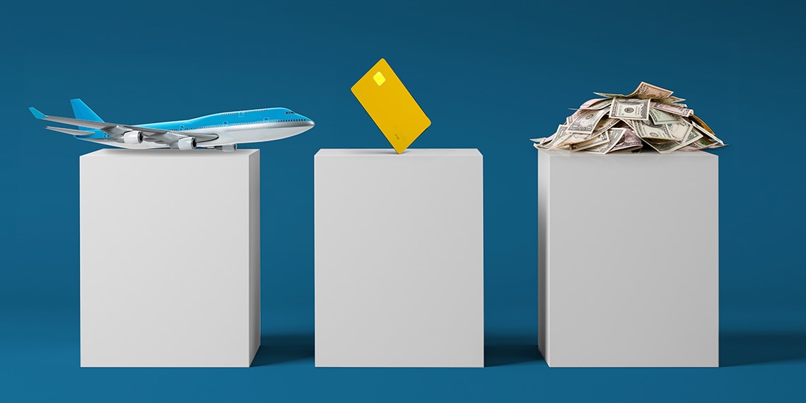 Museum pedestals featuring an airplane, credit card and a pile of money.