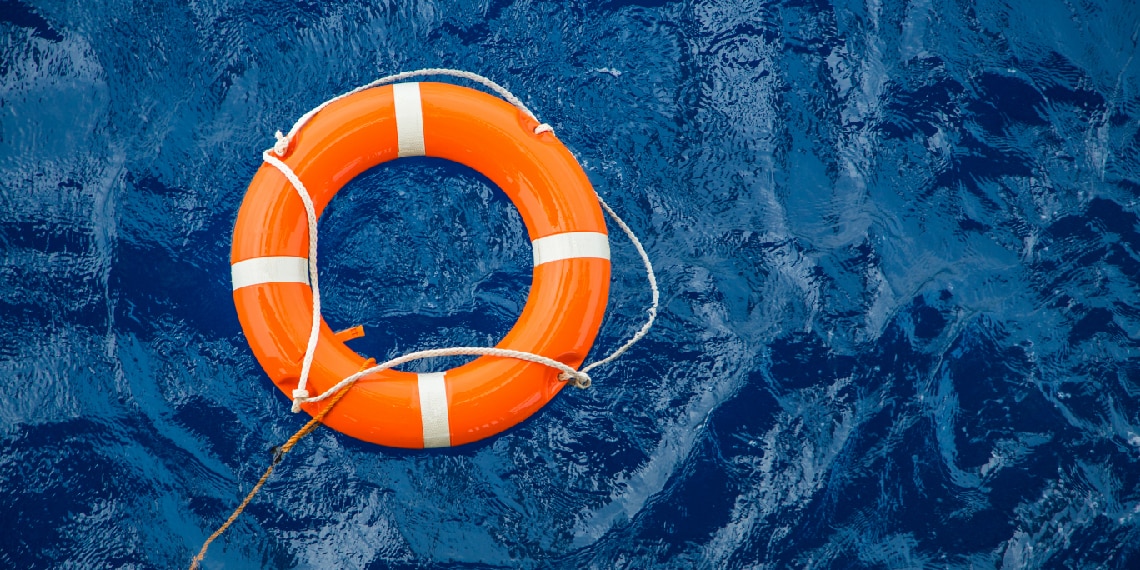 Photo of life preserver floating in the water.