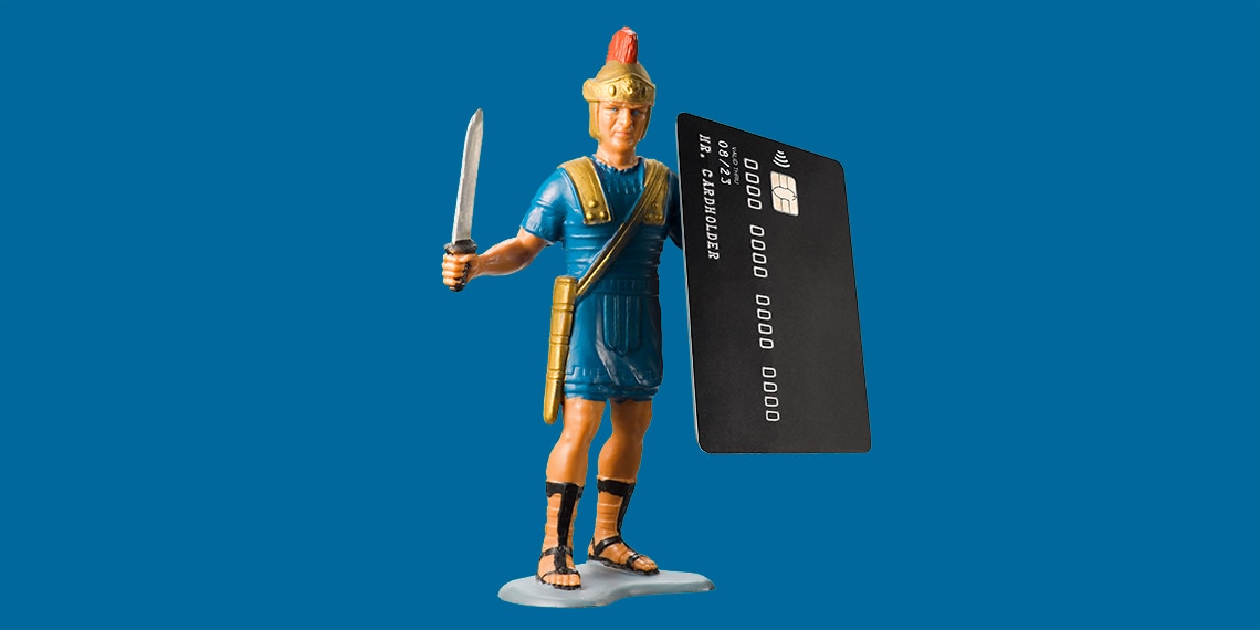 An image of a warrior holding a credit card