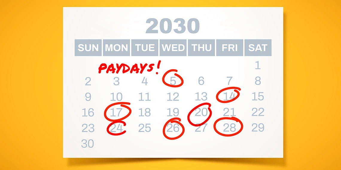 A calendar with paydays circled.