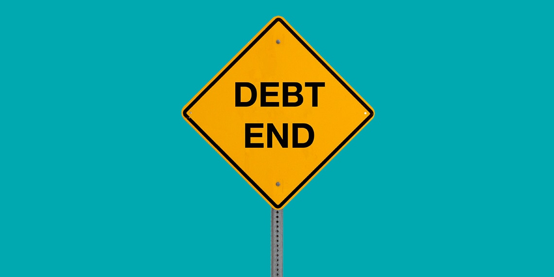 Yellow road sign that reads “Debt End.”