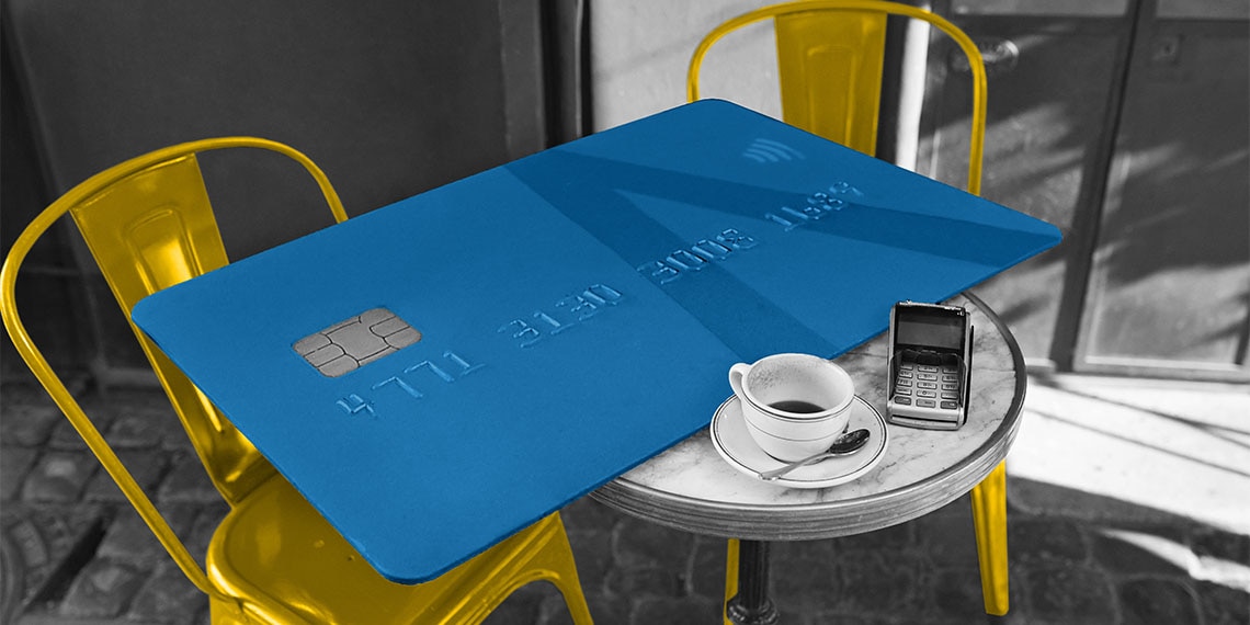 A giant credit card at a cafe.